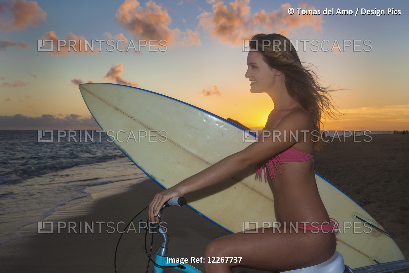Teenage Girl With Bike And Surfboard At The Beach; Kailua, Island Of Hawaii, ...