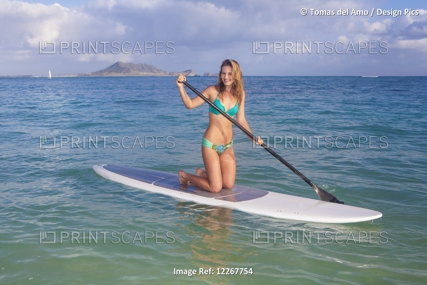 Teenage Girl With Her Paddle Board; Kailua, Island Of Hawaii, Hawaii, United ...