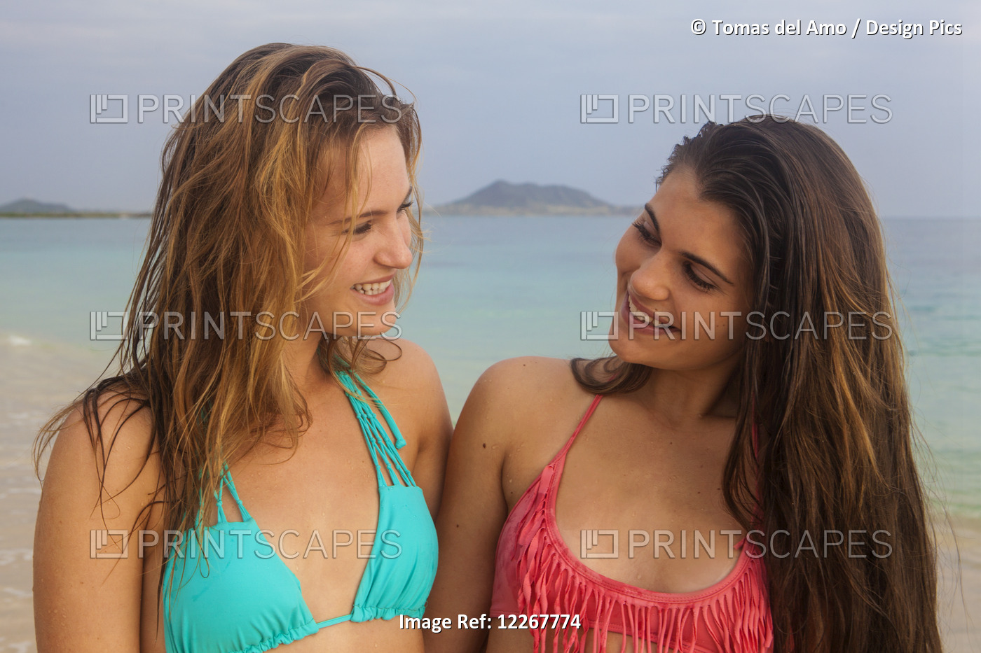 Teenage Sisters At The Beach; Kailua, Island Of Hawaii, Hawaii, United States ...
