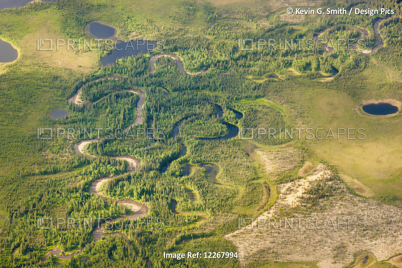 Aerial View Of Green Tundra And A Narrow, Winding Stream, Sand Dunes And Small ...