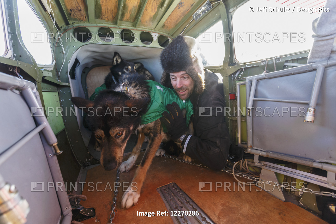Volunteer Iditarod Air Force Pilot Loads A Dropped Dog Into Is Cessna 180 ...