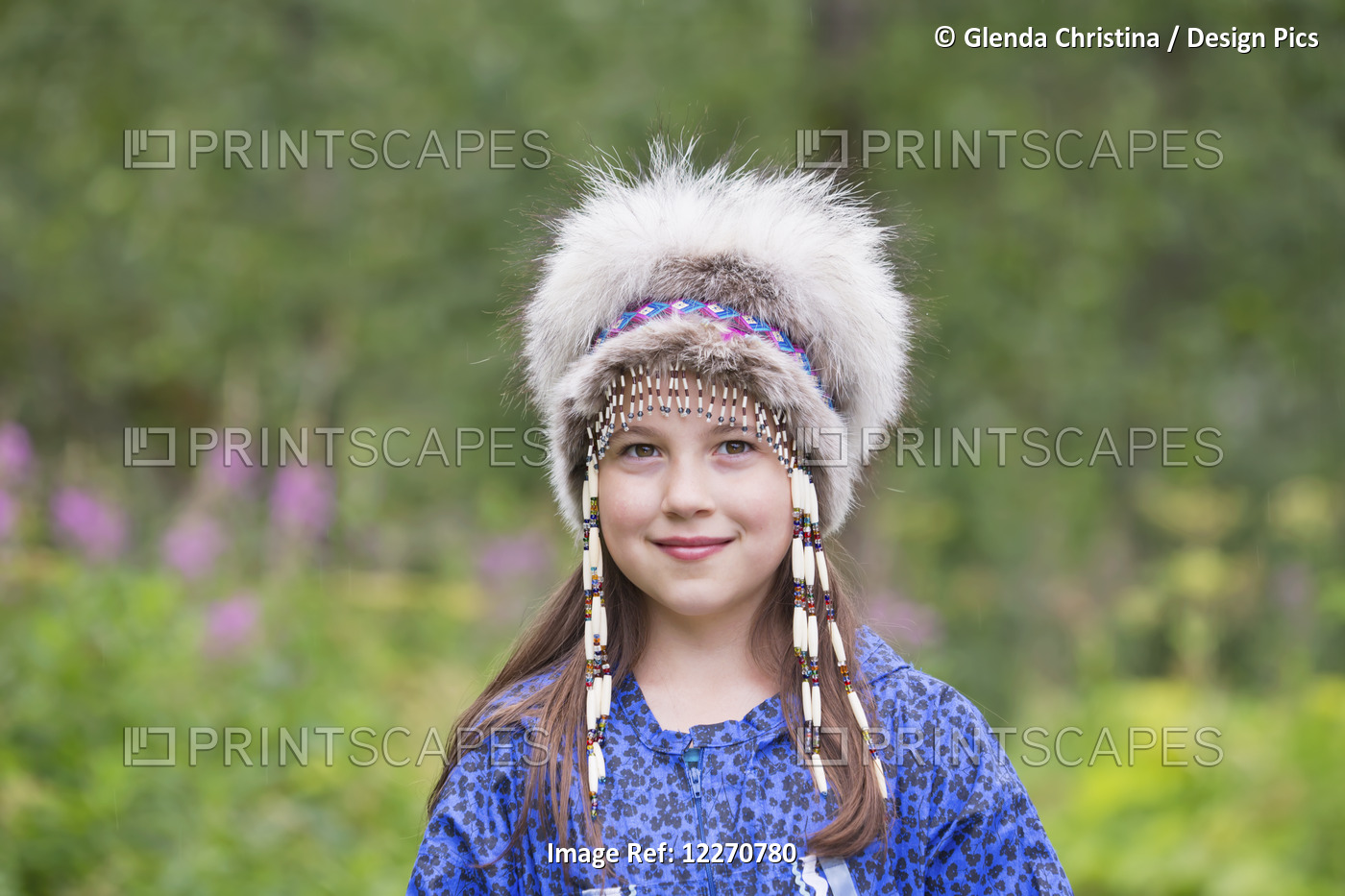 A Young Inupiat Tween Girl In A Traditional Eskimo Kuspuk And Native Headdress, ...