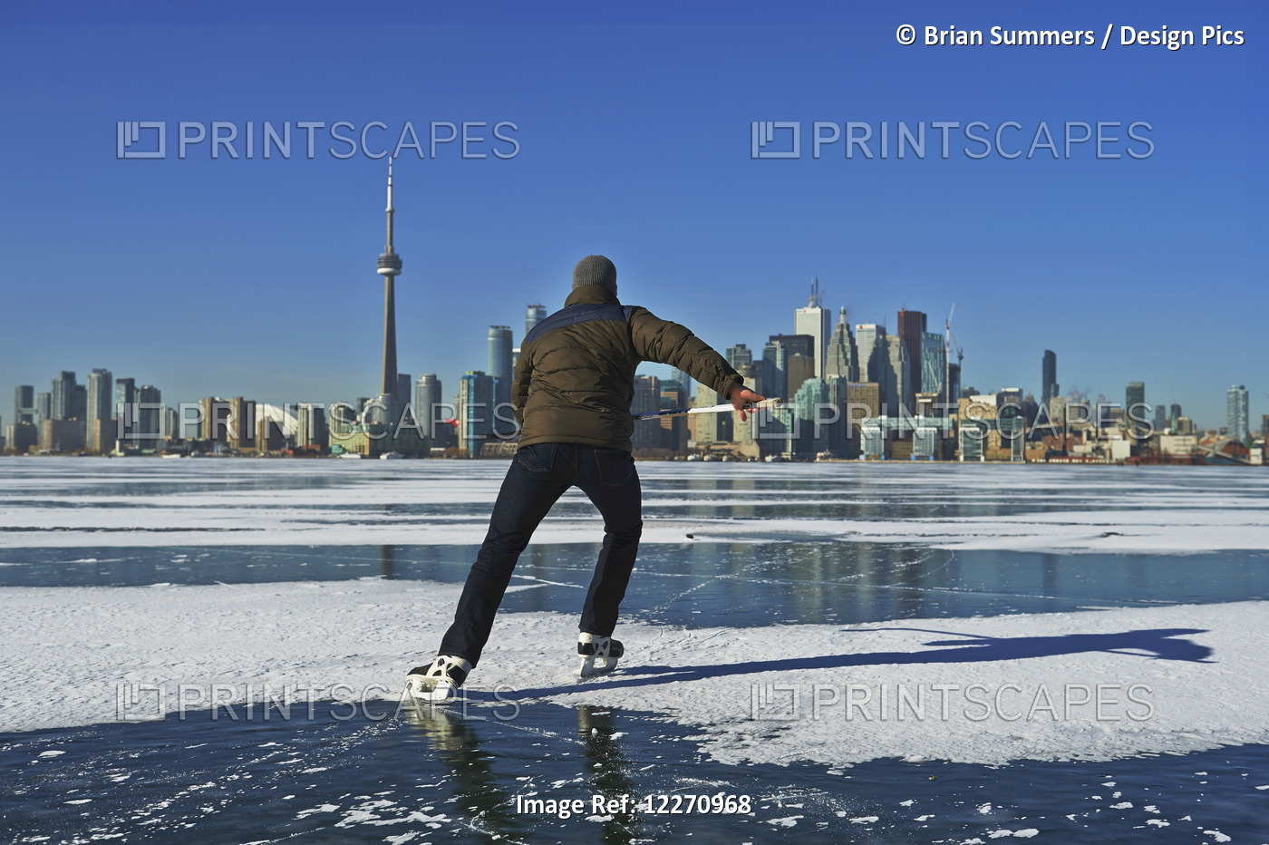 Skater And City Skyline From Ward's Island; Toronto, Ontario, Canada