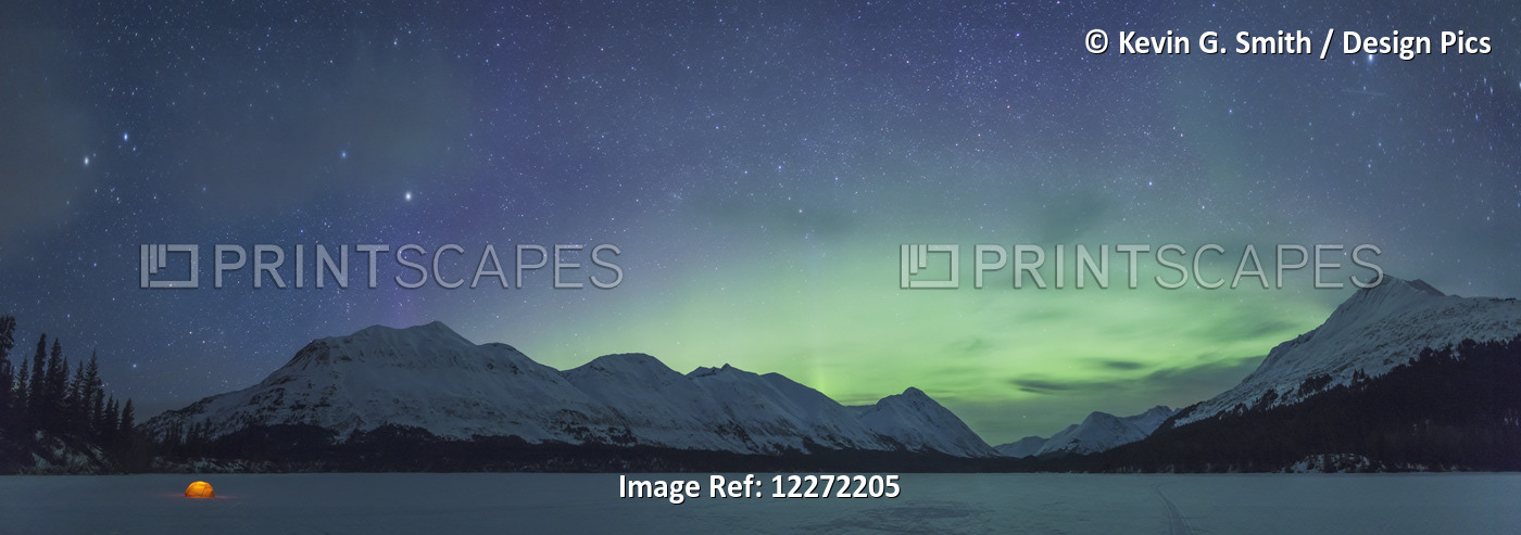 Nighttime Panoramic View Of A Lit Tent On A Snow Covered Trail Lake With The ...
