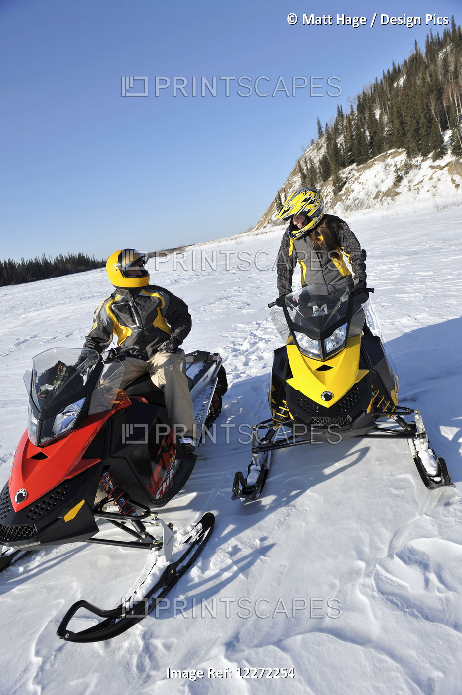 Two Friends Snowmachine Near The Delta River North Of The Alaska Range Between ...