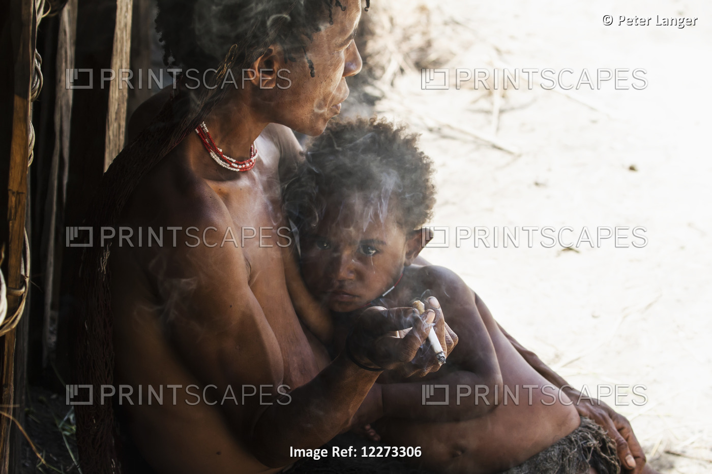 Dani Woman Holding A Boy, Obia Village, Baliem Valley, Central Highlands Of ...