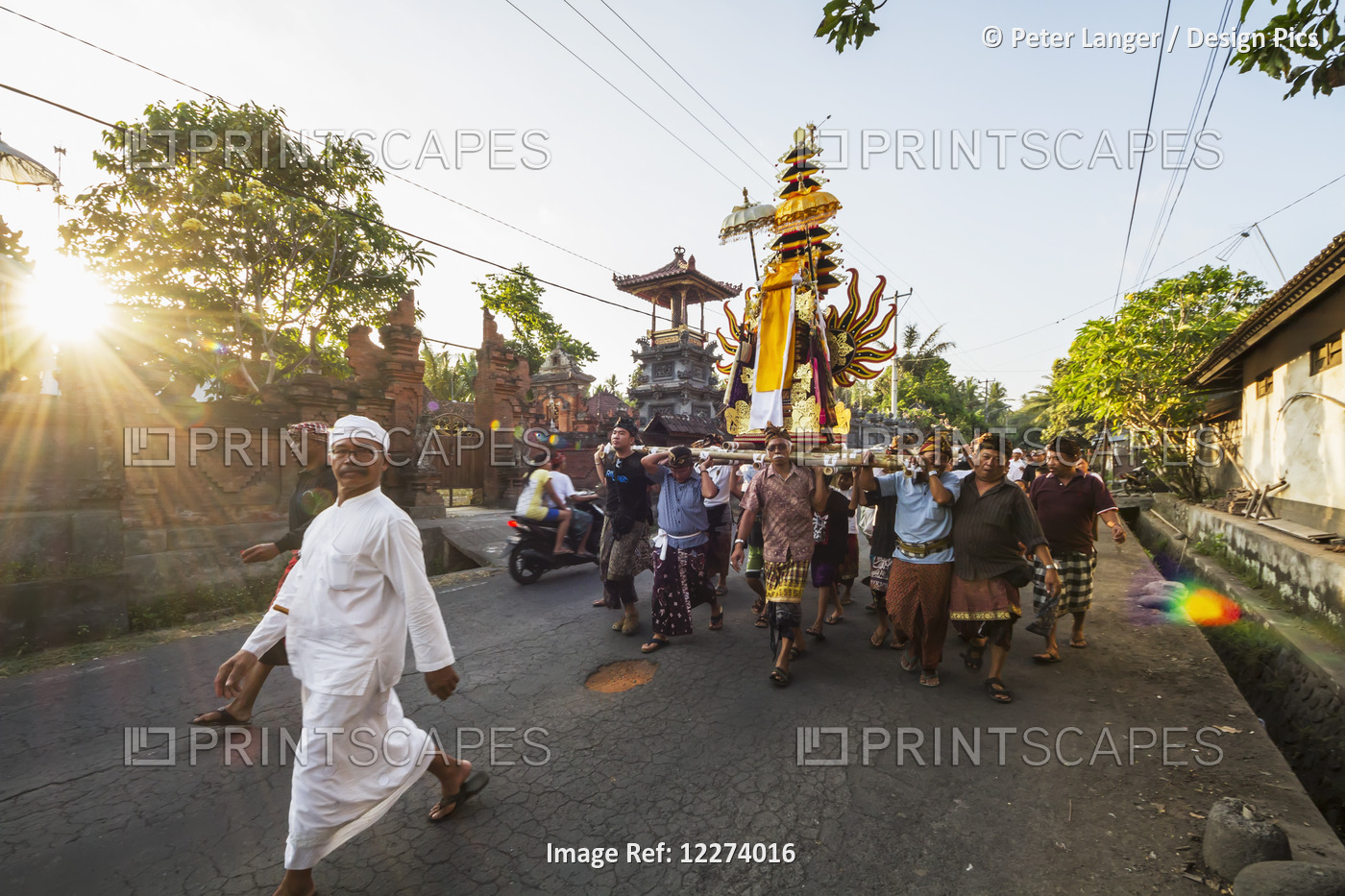 Balinese Men Carrying The Wadah, A Temple-Shaped Structure Made Of Paper And ...
