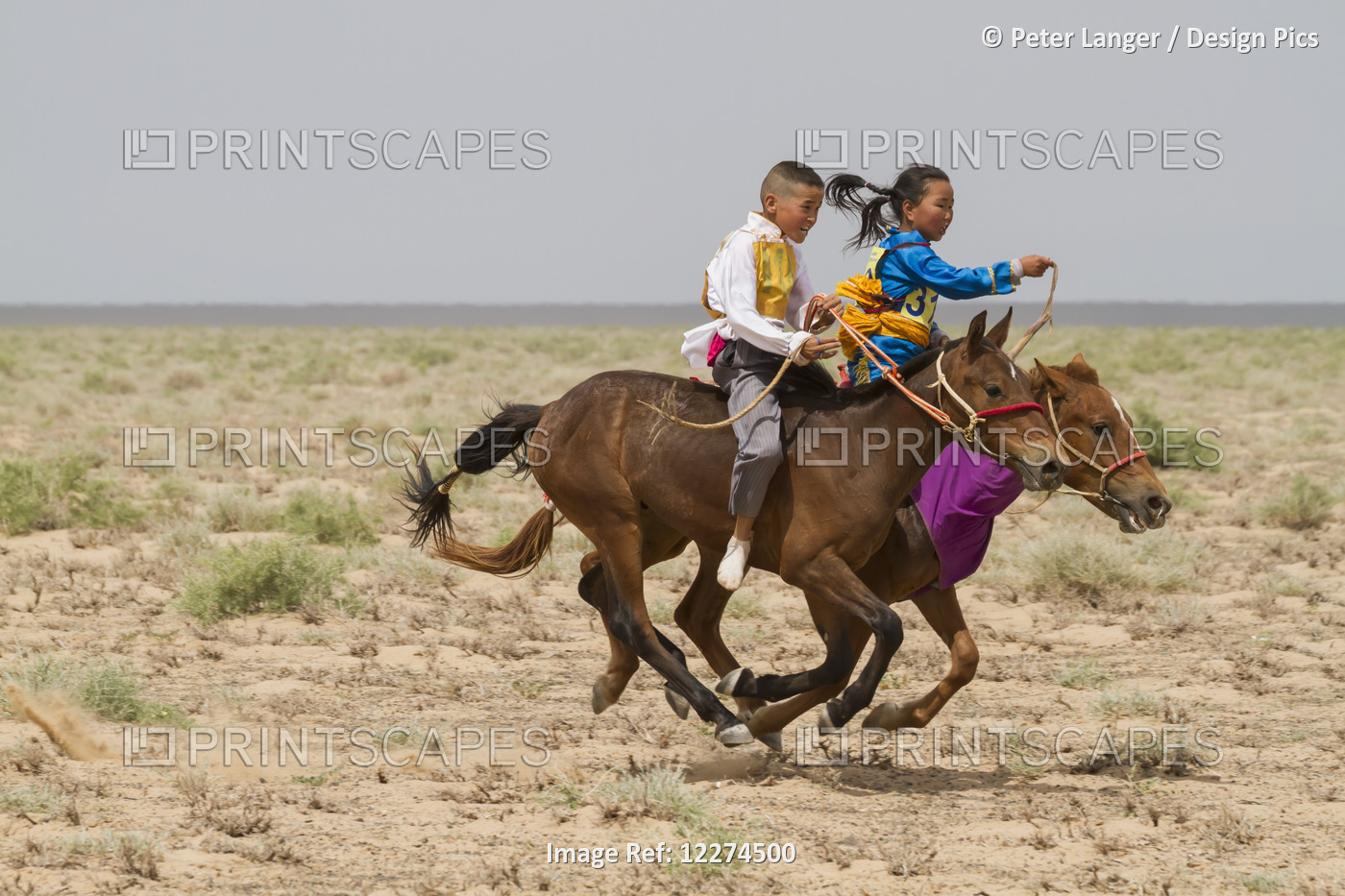 Boy And Girl Riding Horses In The Daaga (Two-Year Old) Horse Race Held During ...