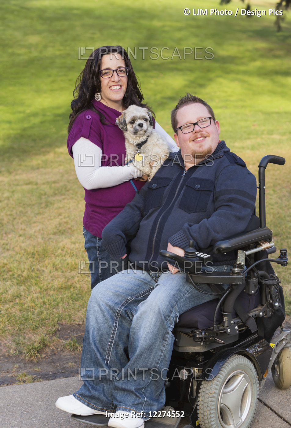 Disabled Husband With His Wife And Their Pet Dog Posing For A Family Portrait ...