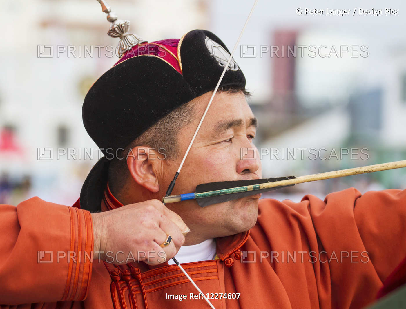 A Mongolian Archer Competes At The 2014 Naadam Mongolian National Festival In ...