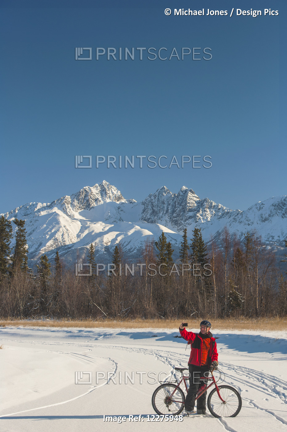 Man Bicycling On Frozen Rabbit Creek In The Palmer Haystack Game Refuge Takes A ...