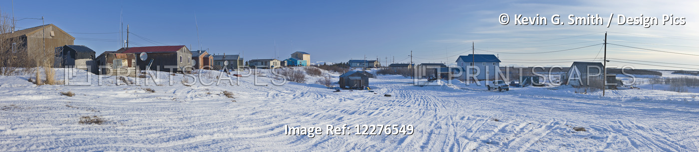 Snowmobile Tracks Run Between Houses And Power Lines In The Village Of Noatak, ...