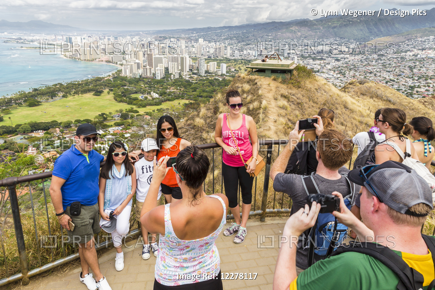 Tourists Taking Family Photos On Diamond Head With Honolulu Waikiki In The ...