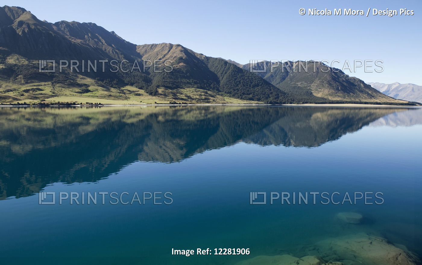 Lake Hawea With Reflections Of Mountains; South Island, New Zealand