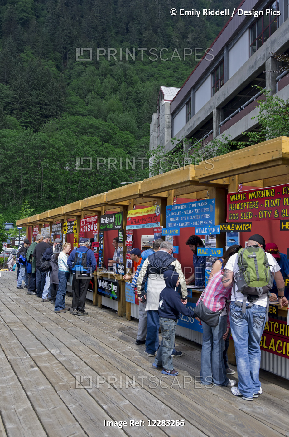 Tourists Line Up At Eleven Tour Companies Booths In A Line At The Cruise Ship ...
