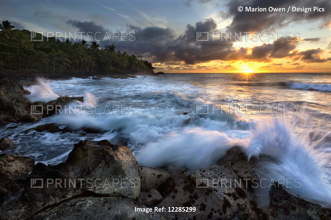 Sunrise Over The Ocean And A View Of The Coastline; Opihikao, Island Of Hawaii, ...