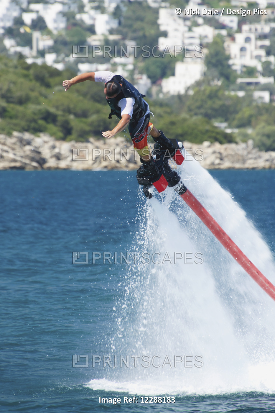 Flyboarder Diving Into Water From Great Height; Torba, Mugla Province, Turkey