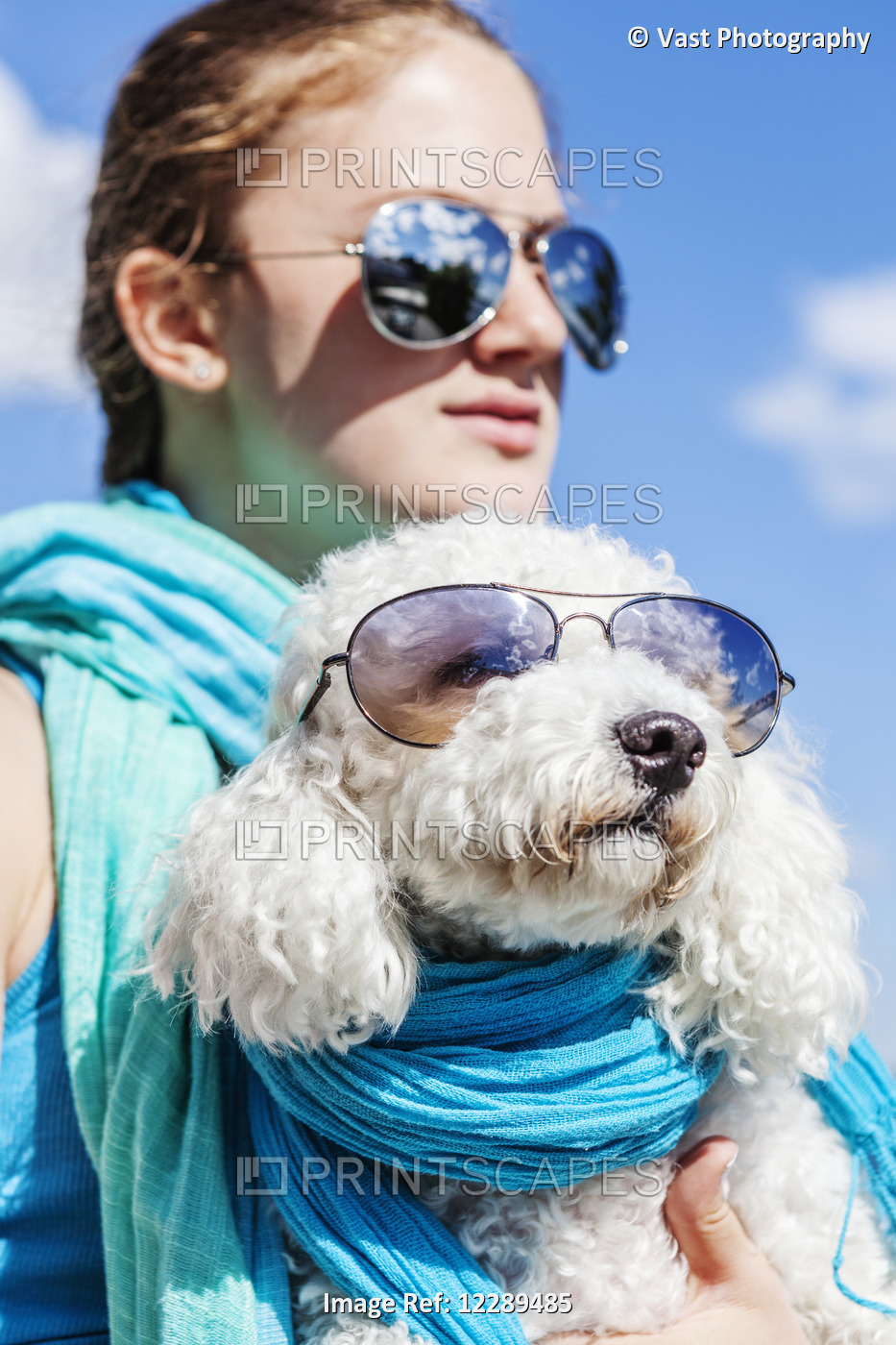 Girl And Her Dog Wearing Matching Sunglasses; Balsam Lake, Ontario, Canada