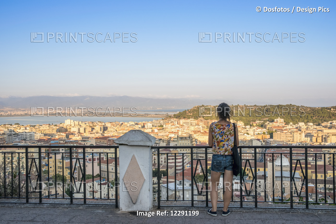 Girl Enjoying The Panoramic View Of The City Of Cagliari; Cagliari, Sardinia, ...