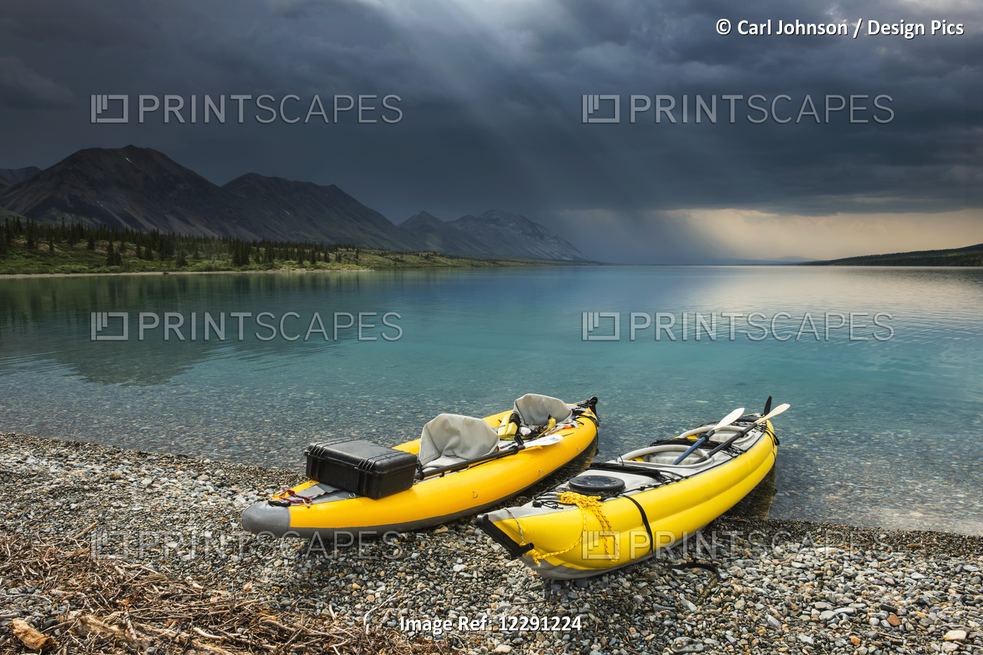 A Pair Of Yellow Inflatable Kayaks On The Lower Twin Lake Beach With A Summer ...