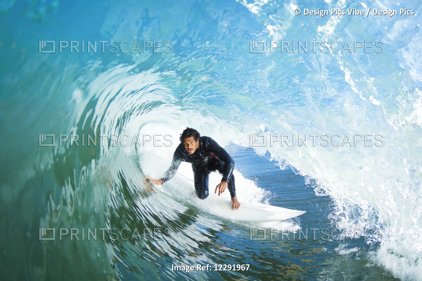 Surfer On Blue Ocean Wave