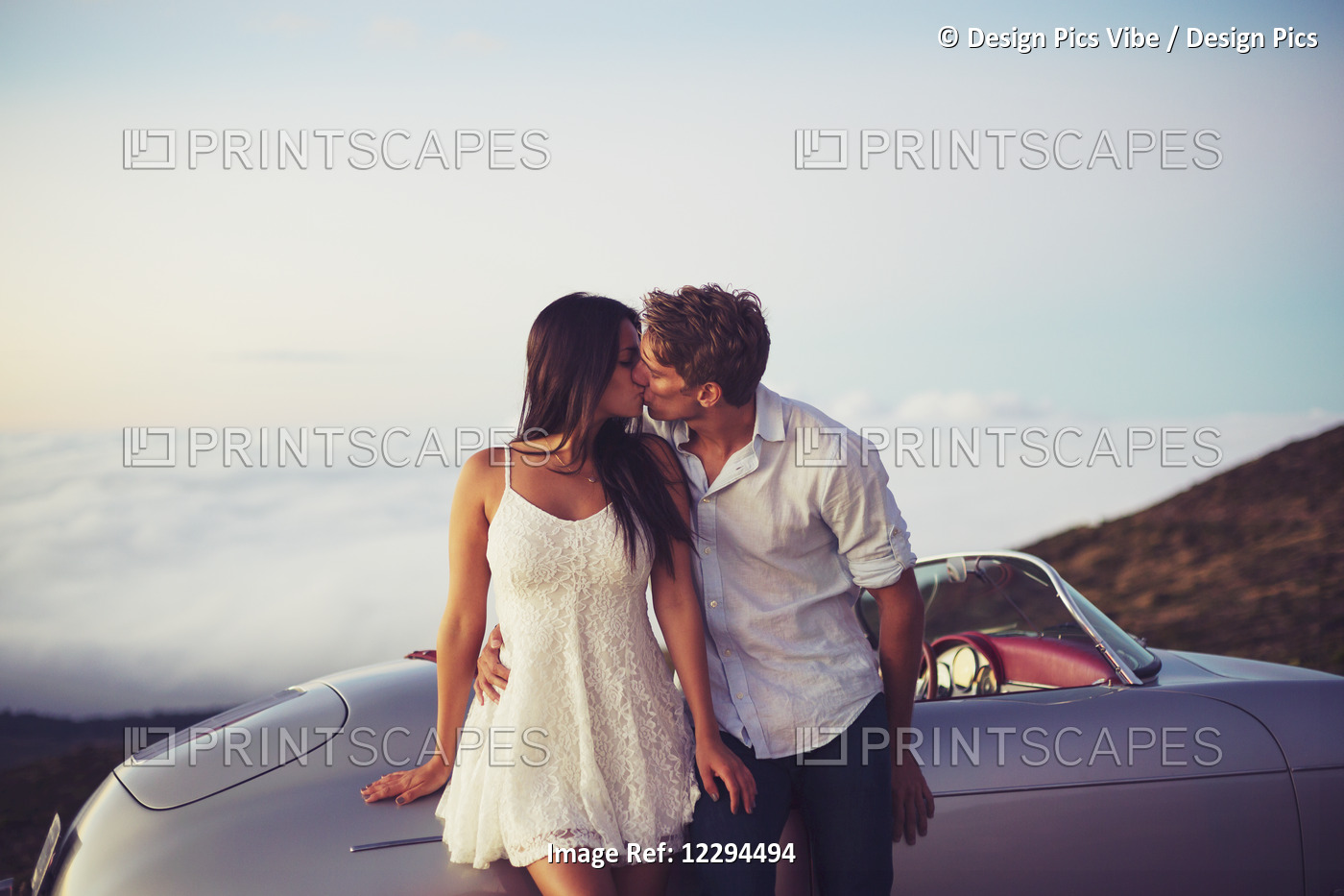 Romantic Young Attractive Couple Watching The Sunset And Kissing With Classic ...
