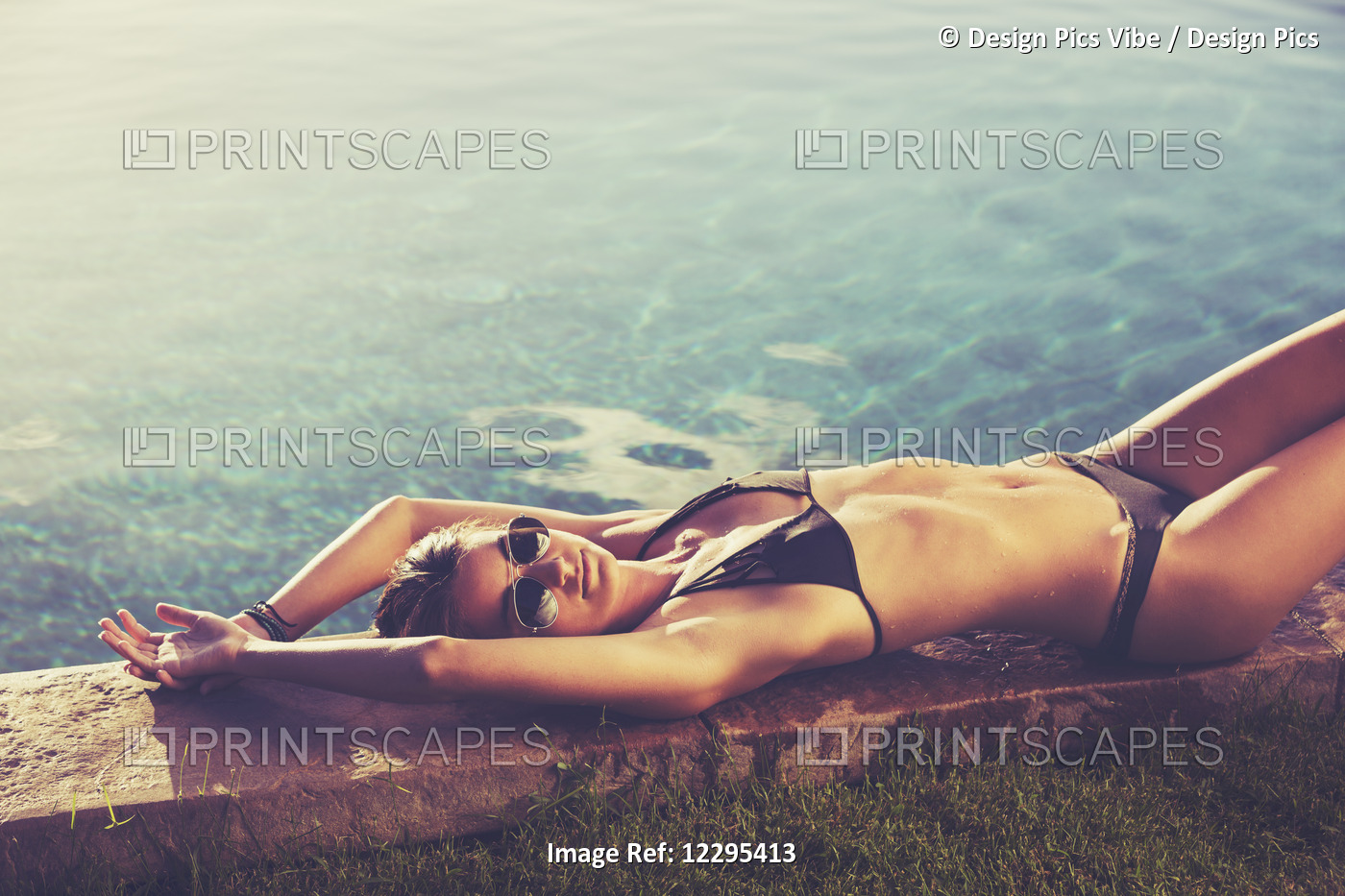 Fashion Lifestyle, Beautiful Woman In Swimwear Relaxing By The Pool At Sunset
