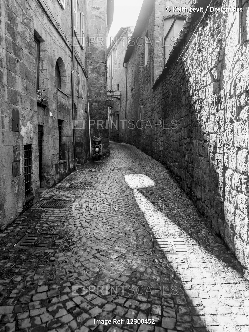 Narrow Cobblestone Alley Between Buildings; Orvieto, Umbria, Italy