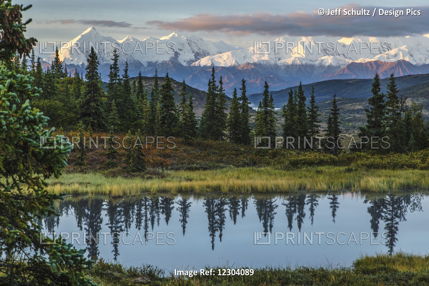 Scenic Sunrise View Over Mt. Brooks And The Alaska Range With A Tundra Pond In ...