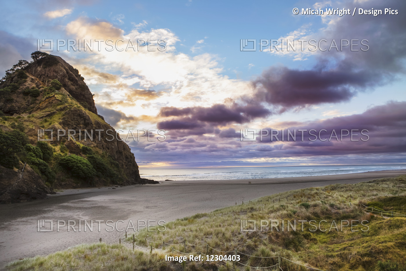 A Sunset At The Surf Beach Of Piha, Just Outside Of Auckland; New Zealand