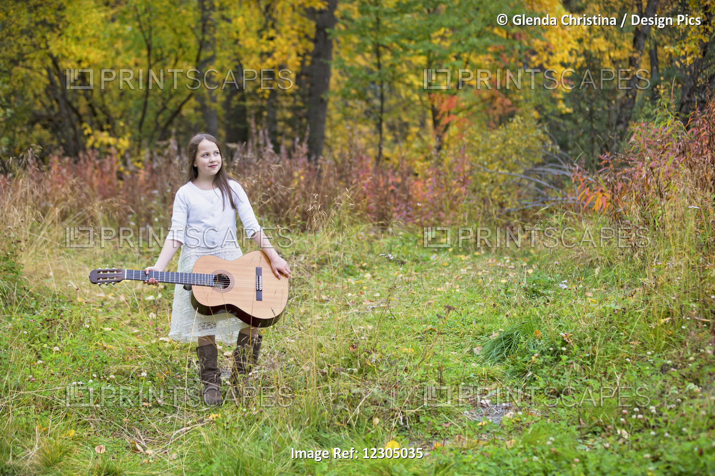 Young Girl Holding A Guitar Outdoors In The Hatcher Pass Area, Southcentral ...