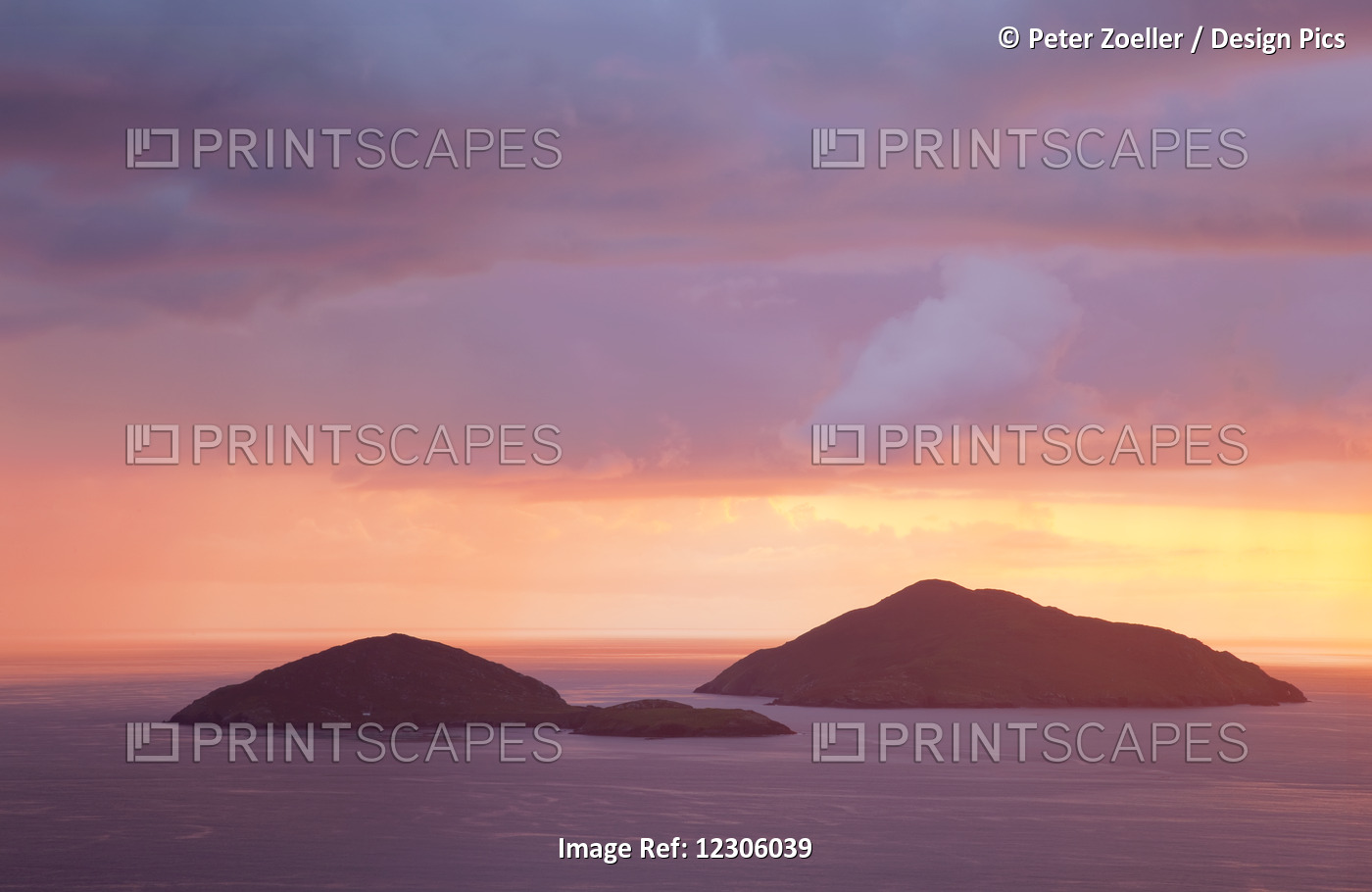 Small Islands Out In The Ocean With A Dramatic Colourful Sky At Sunset; ...