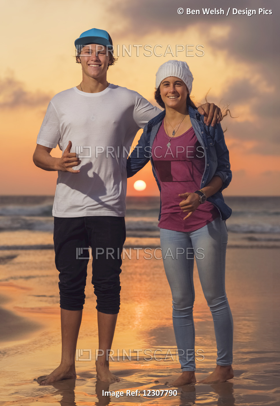 Kitesurfing World Champions Posing For A Picture On The Beach At Sunset; ...