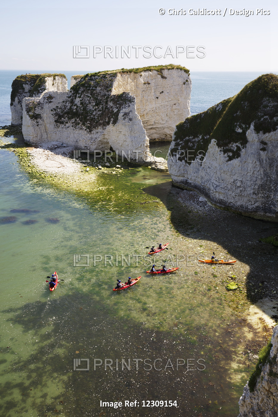 Lime Stone Sea Stacks With Canoeists, Dorset