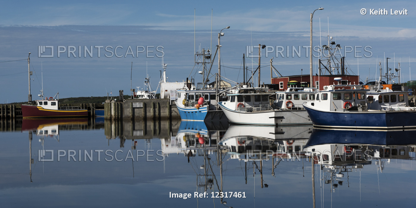 Fishing Boats Moored In The Tranquil Water Of A Harbour; Petit Etang, Nova ...