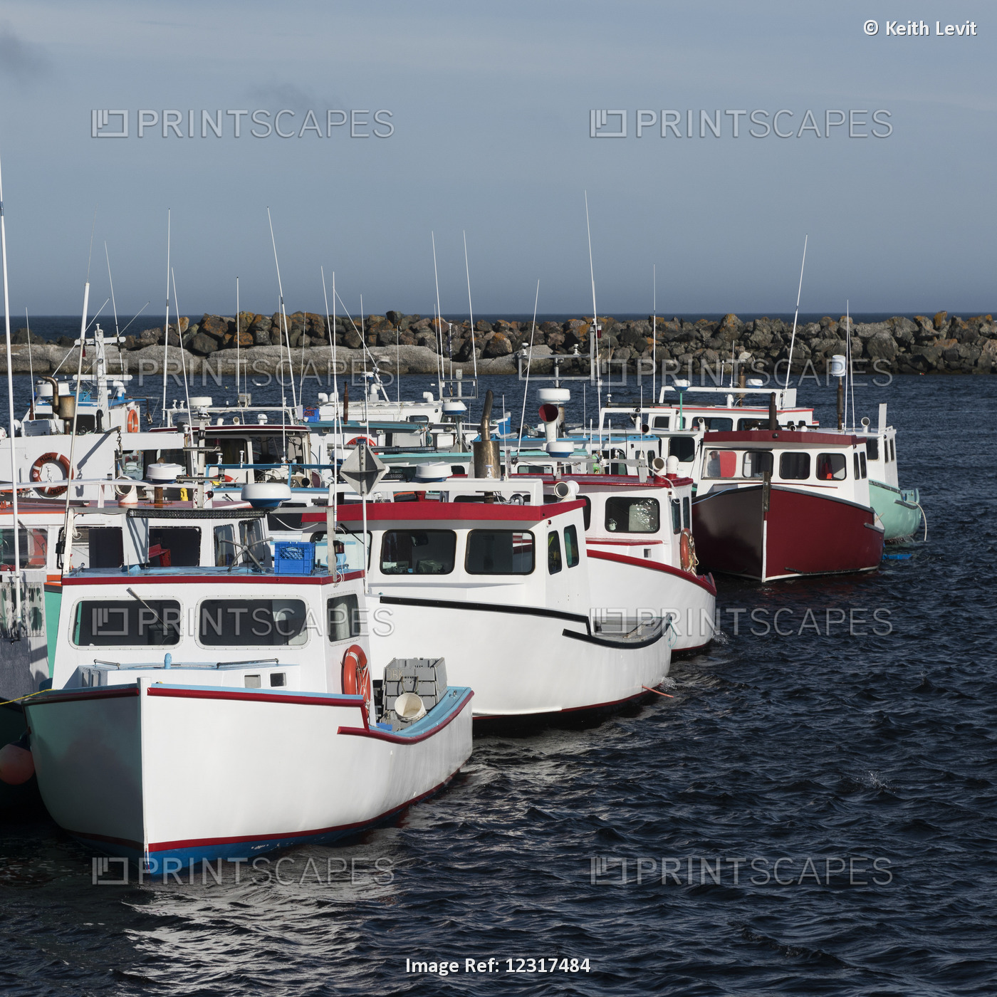 Fishing Boats Moored In A Harbour; Main-A-Dieu, Nova Scotia, Canada