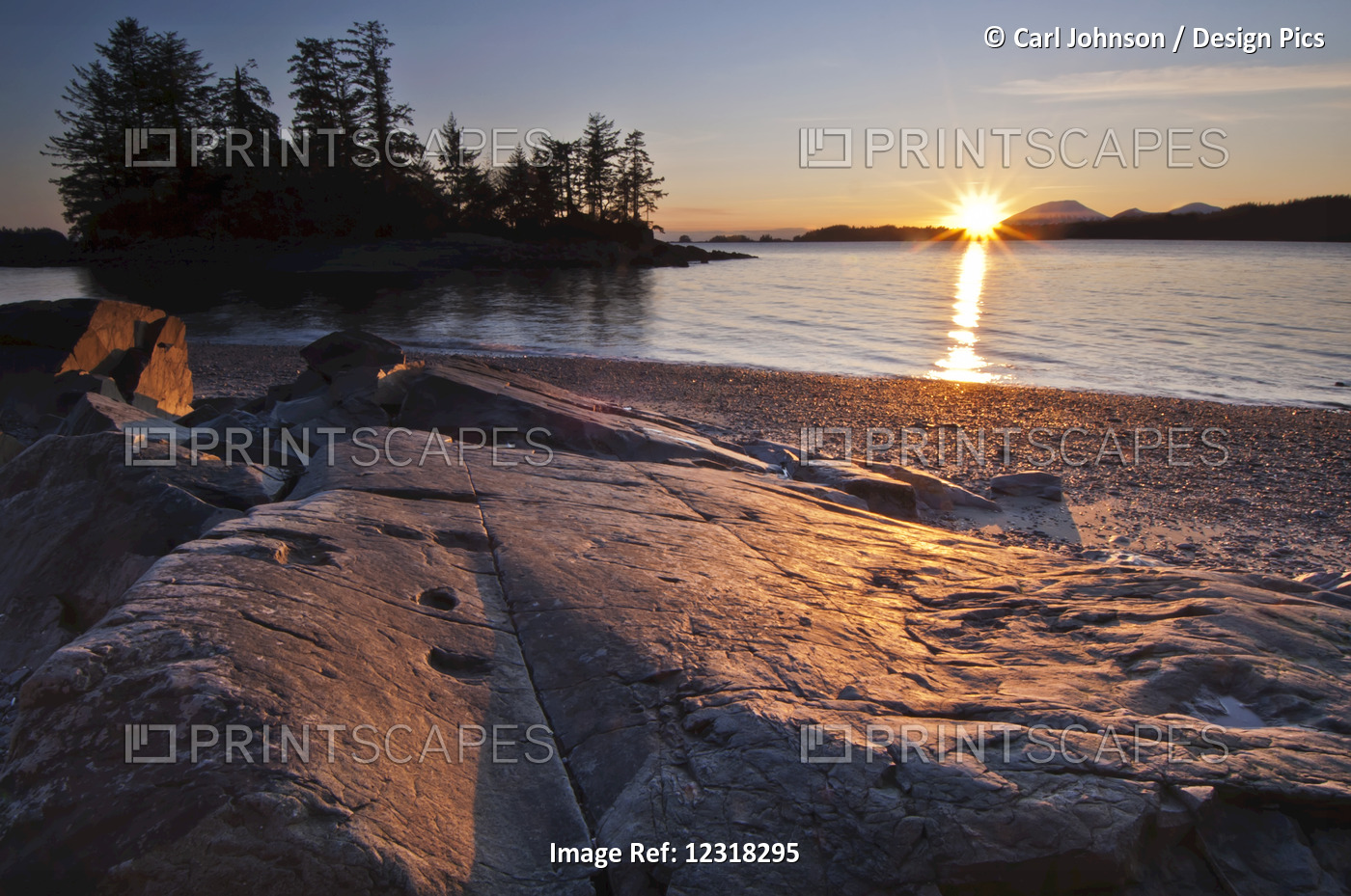 View Of Magic Island And Sunset Behind Mt. Edgecombe From Rocks And Beach At ...
