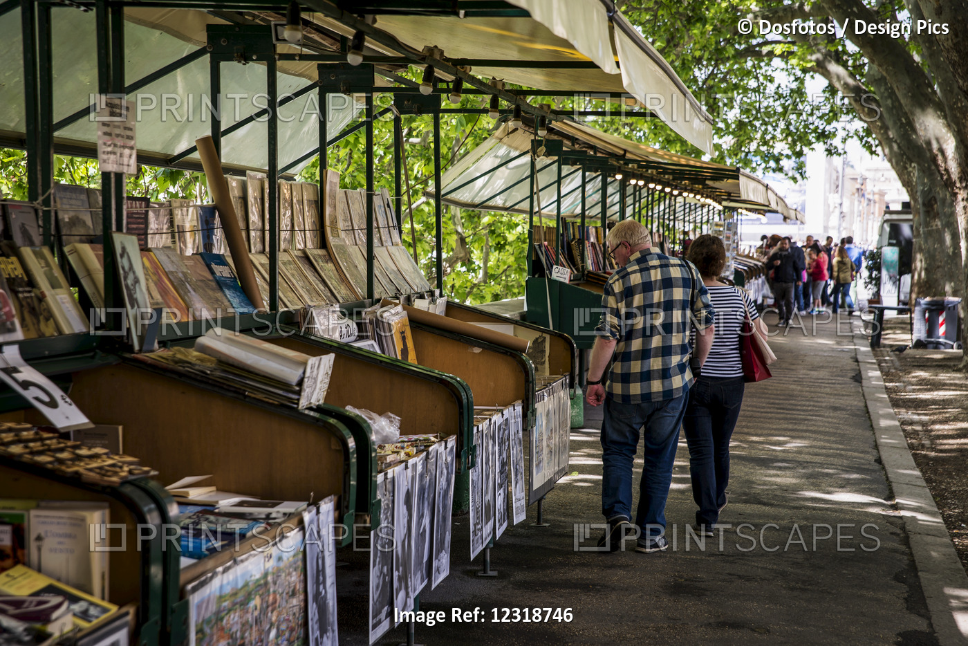 Tourists At A Prints Market; Rome, Italy