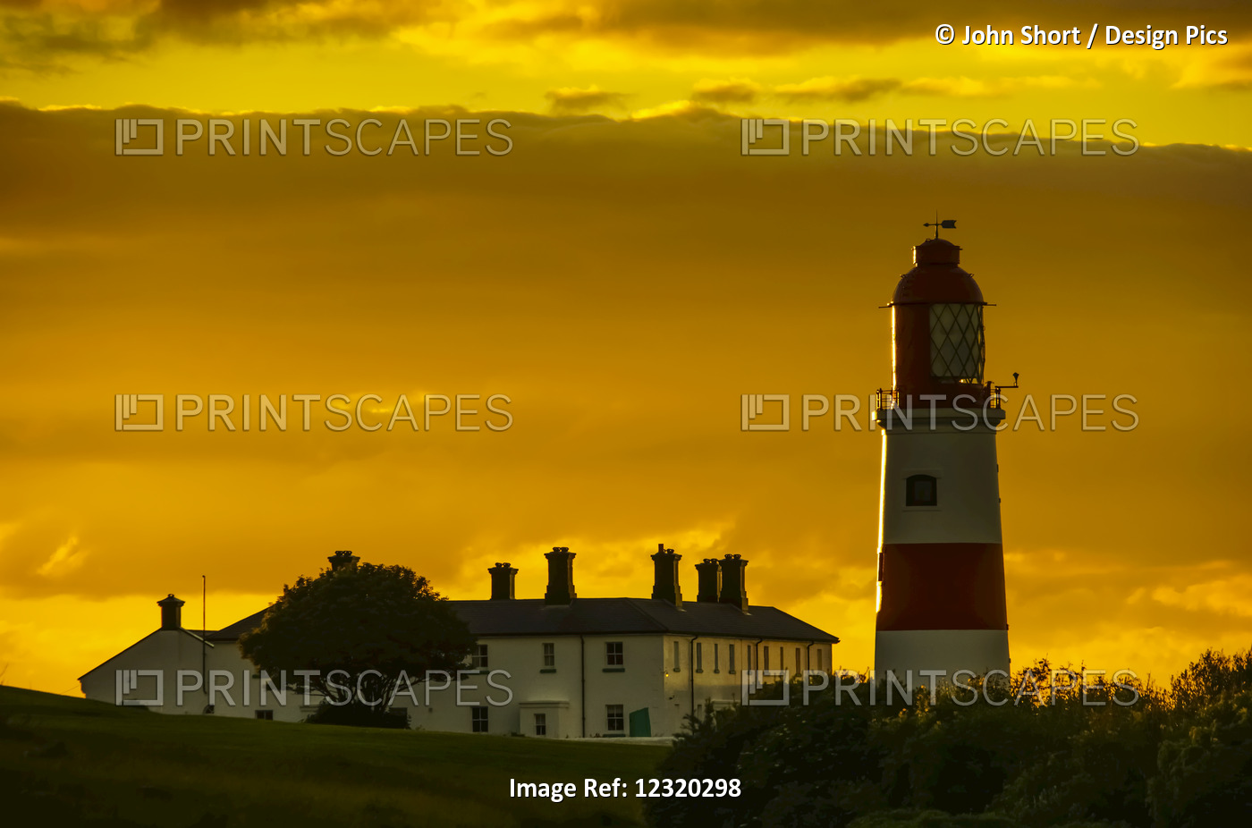 Souter Lighthouse Under A Glowing Golden Sky At Sunset; South Shields, Tyne And ...