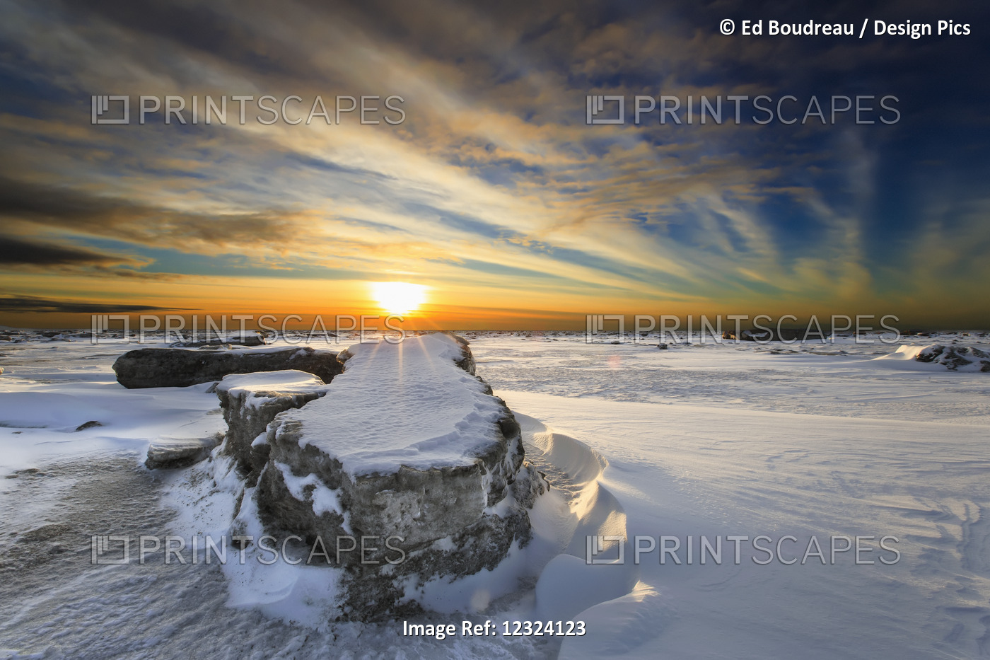 A Large Ice Block On Frozen Turnagain Arm At Sunset; Anchorage, Alaska, United ...