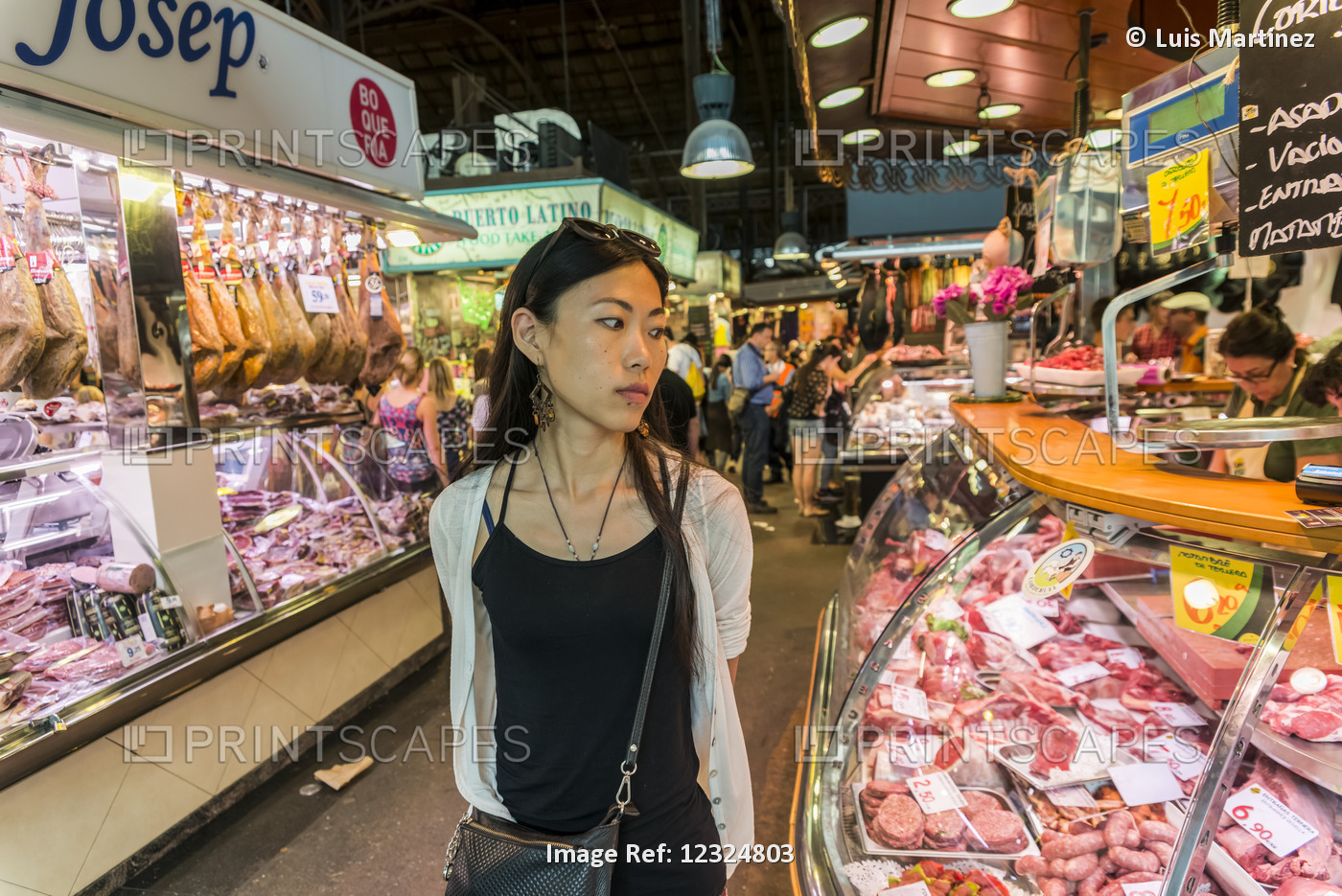 A Young Chinese Woman Shops At Boqueria Market, One Of The Most Famous Markets ...