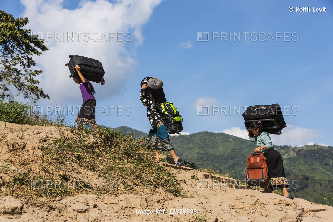 Woman Carry Suitcases And Backpacks On Their Heads Up Steps; Luang Prabang ...