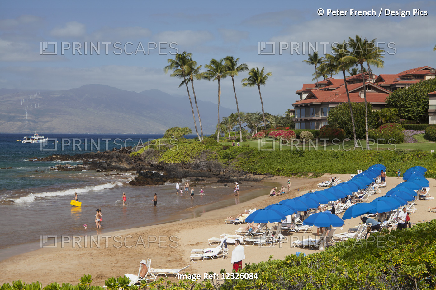 Beach Umbrellas On Polo Beach And A Snorkel Boat Off The Shore; Wailea, Maui, ...