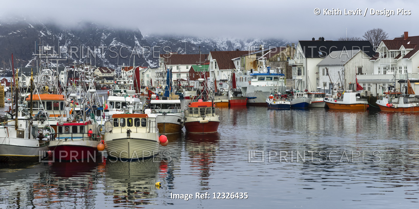 Boats In The Harbour And Buildings On The Shore With Low Cloud Hanging ...