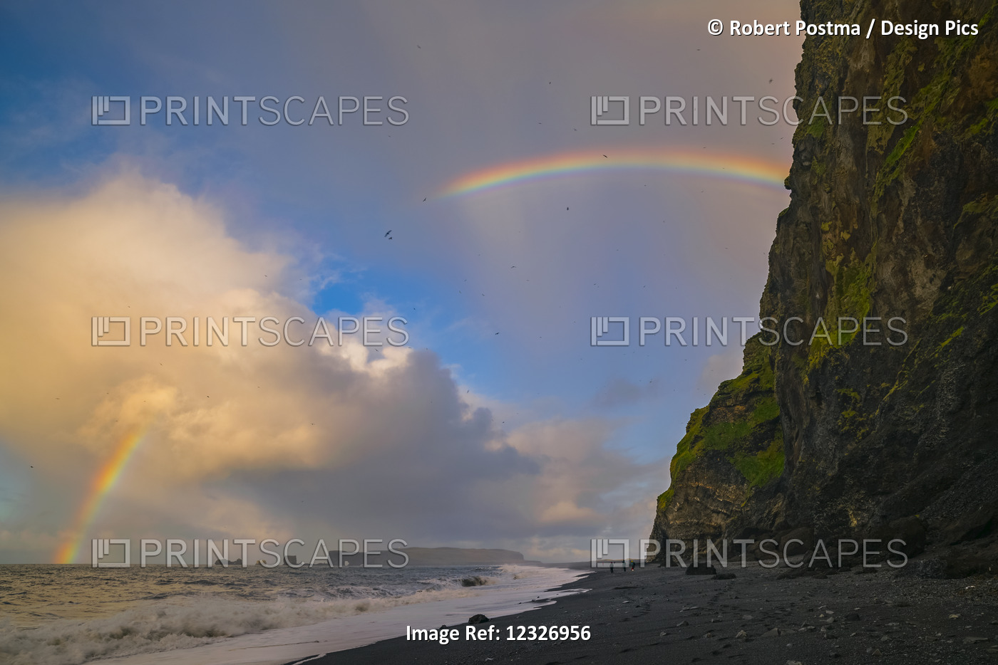 The Sea Stacks Known As Reynisdrangar With Waves At Sunrise, And Thousands Of ...