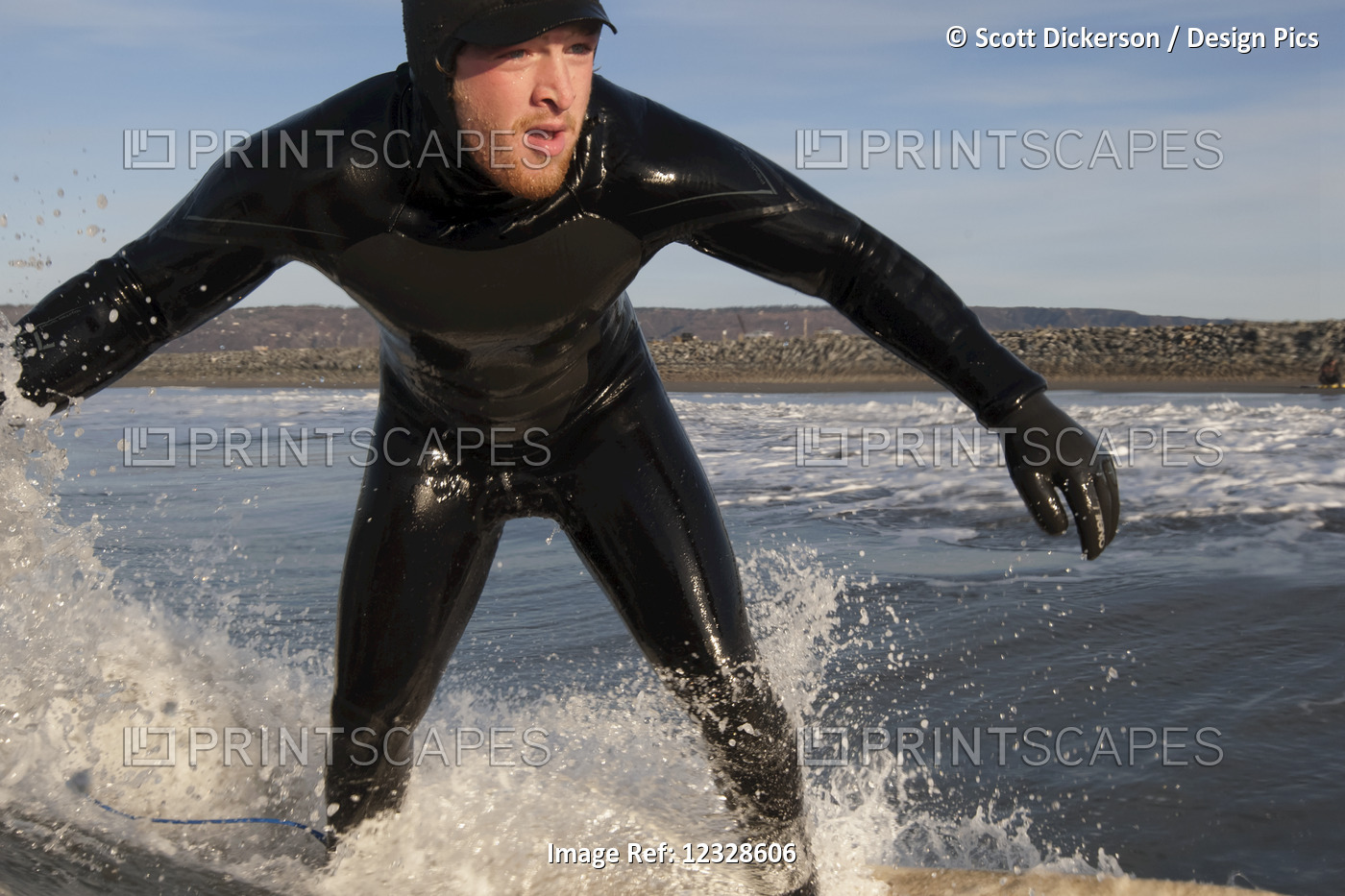 Man surfing, South-central Alaska; Homer, Alaska, United States of America
