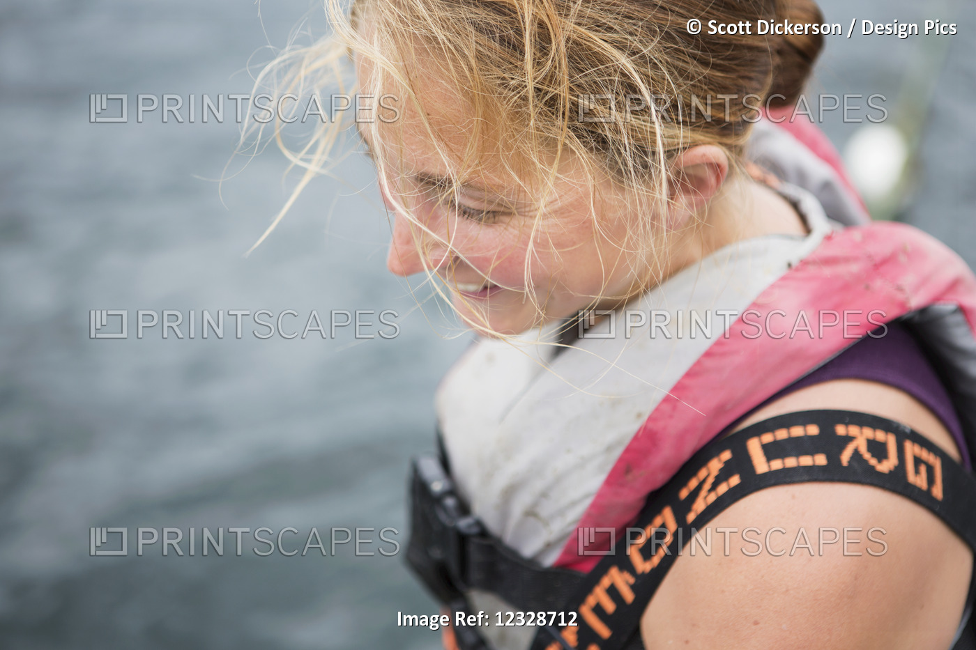 Close-up of a female set-net fisherman in her skiff near Seldovia, ...