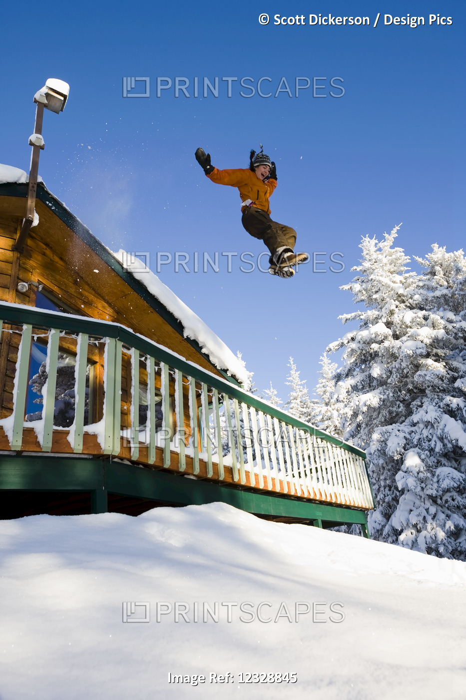 A Young Woman Jumps Off The Roof Of Her House Into Deep Snow In The Yard; ...
