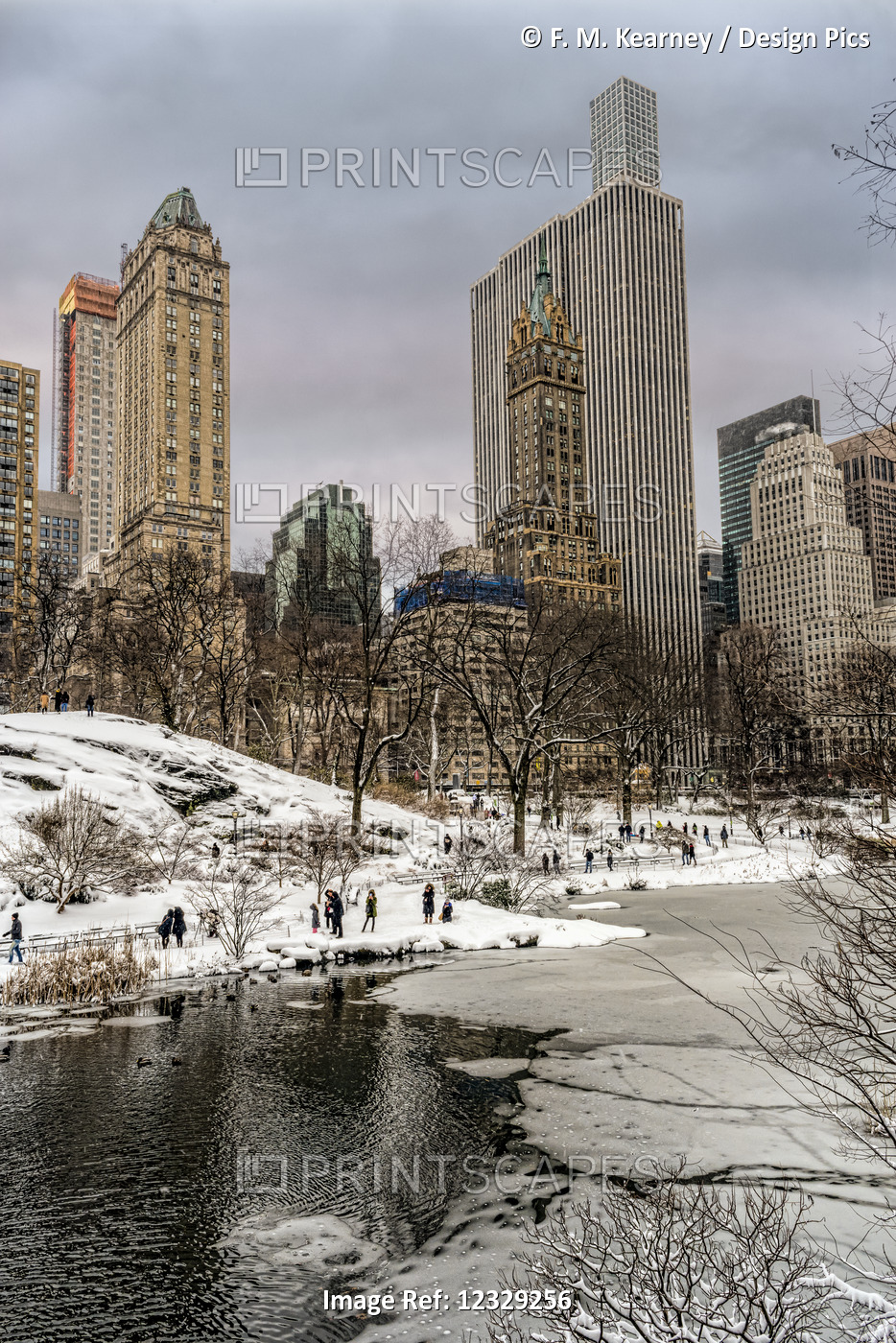 The Pond Partially Frozen After A Snowstorm, In Central Park; New York City, ...