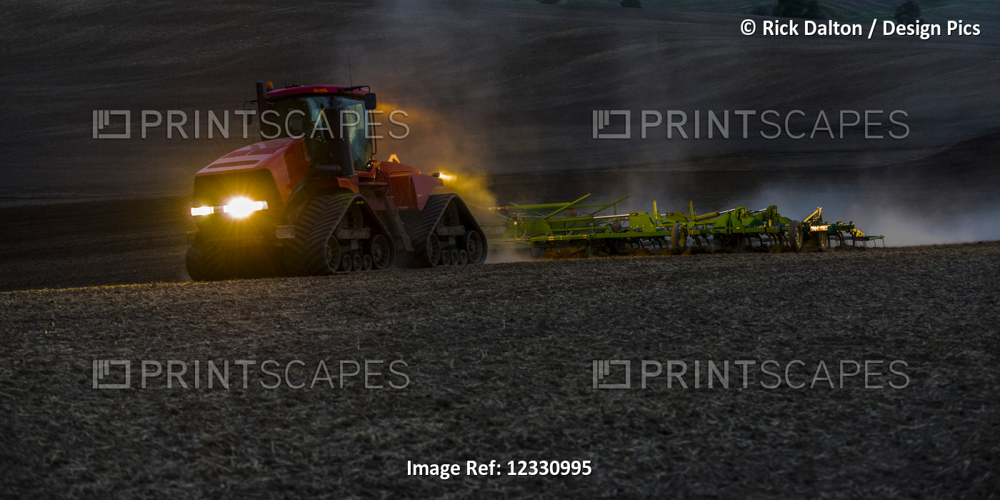 Quadtrac Tractor Seeding Garbanzo Beans At Dusk In The Palouse Region Of ...